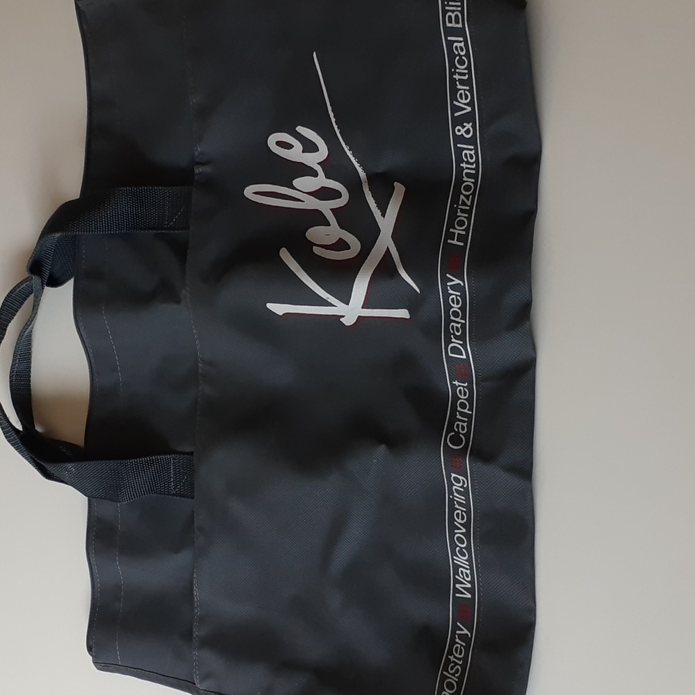 2/$10.00 Portfolio type bag with zipper and sturdy handles